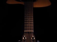 photography of dreadnought acoustic guitar